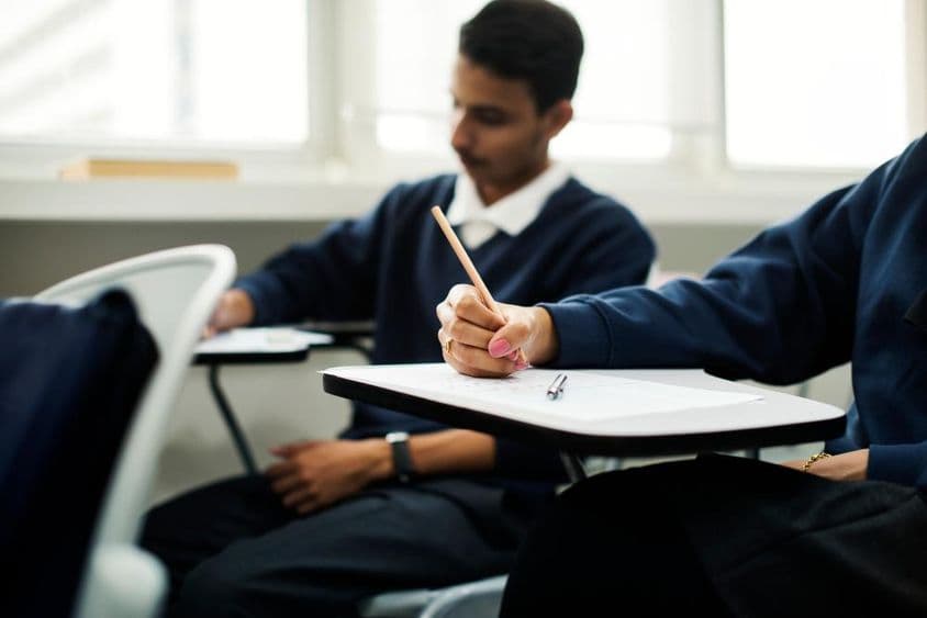 Muslim children learning in a classroom.