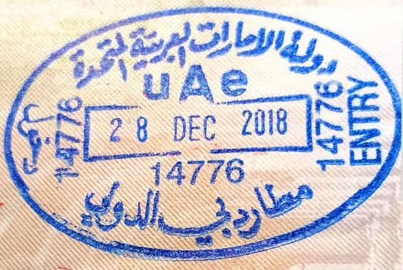 The entry stamp of the United Arab Emirates in a foreign passport in Dubai.