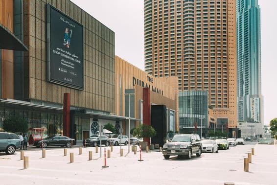 Parked cars near a shopping mall in Dubai.