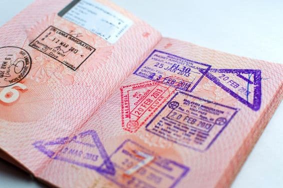 Russian passport with stamp at border checkpoint. Departure and arrival immigration stamps.