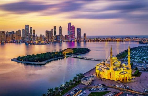 Sharjah City Skyline at sunset.