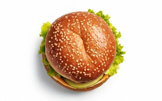 Classic cheeseburger, artistically presented.