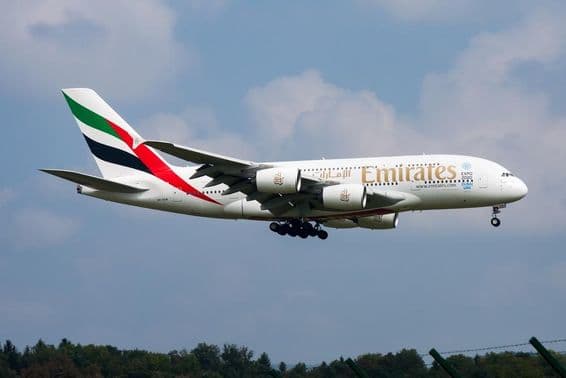 Emirates Airlines passenger plane landing at the airport.
