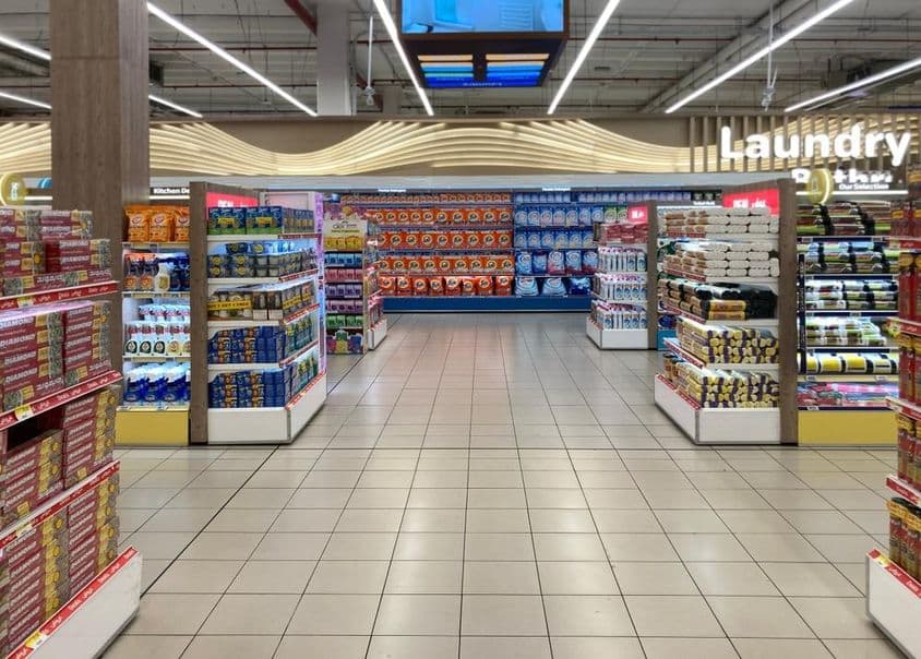 Laundry and household goods section in a supermarket in Dubai.