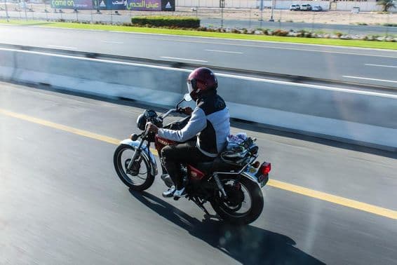 Motorcyclist on a Yamaha motorcycle on Sheikh Zayed Road in Dubai.