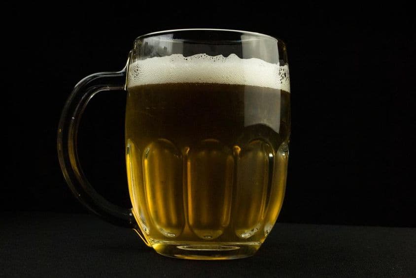 Beer mug with frothy top.