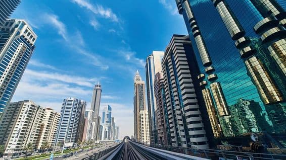 Dubai cityscape, buildings, skyscrapers, roads.