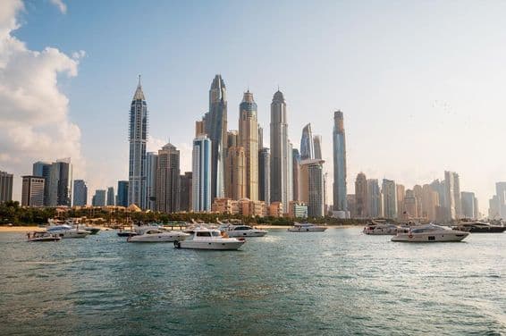 Dubai skyscrapers viewed from a boat.