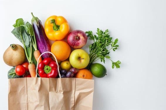 Healthy food in a paper bag, vegetables and fruits.