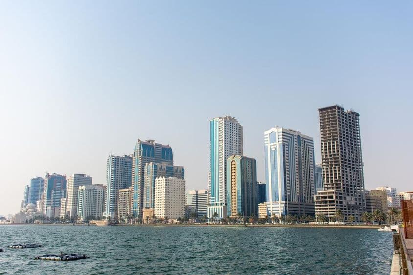 Skyscrapers along the waterfront in Sharjah city.