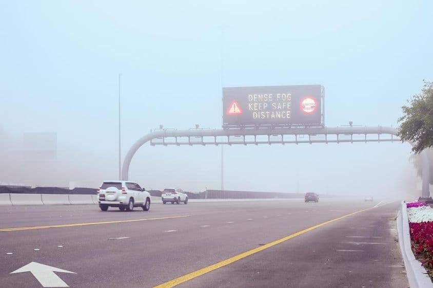 Foggy weather on Dubai road.