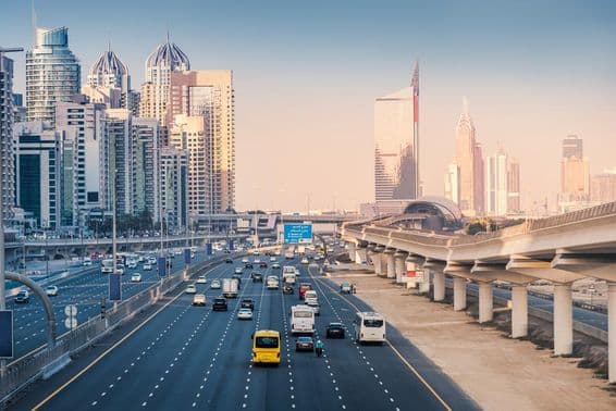 Highway with metro lines and skyscrapers in Dubai Marina area