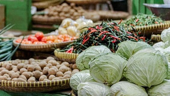 Image of chillis and cabbages at the Dubai market.