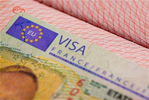France Schengen visa in a passport.