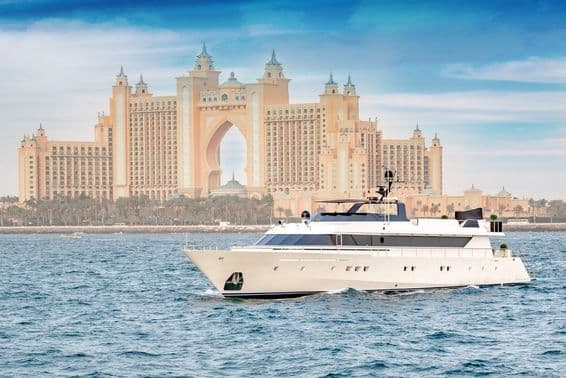 Luxury yachting in Dubai with Atlantis in the background.