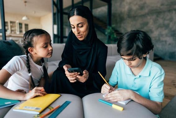 Traditional Arab family in Dubai spending time together at home.