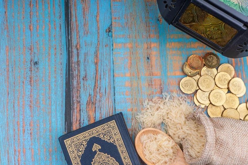 Zakat as a form of religious obligation in almsgiving.
