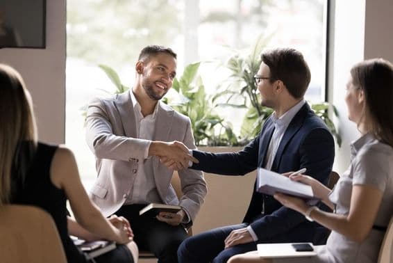 Boss thanking an employee for an idea.