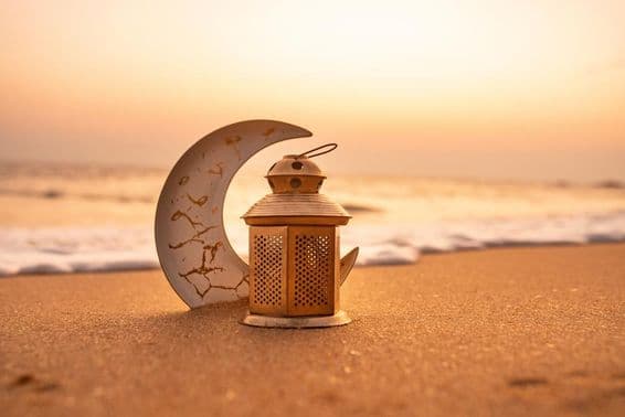 Traditional candlelit crescent moon on the beach.