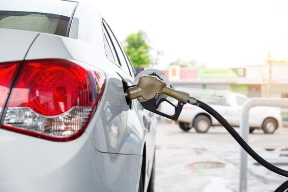 A car refueling at a Dubai gas station.