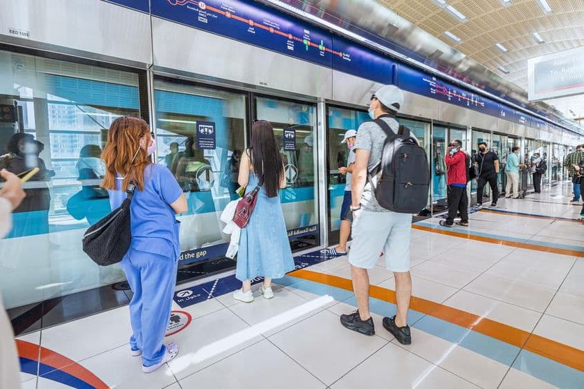Dubai, passengers boarding the arriving metro train.