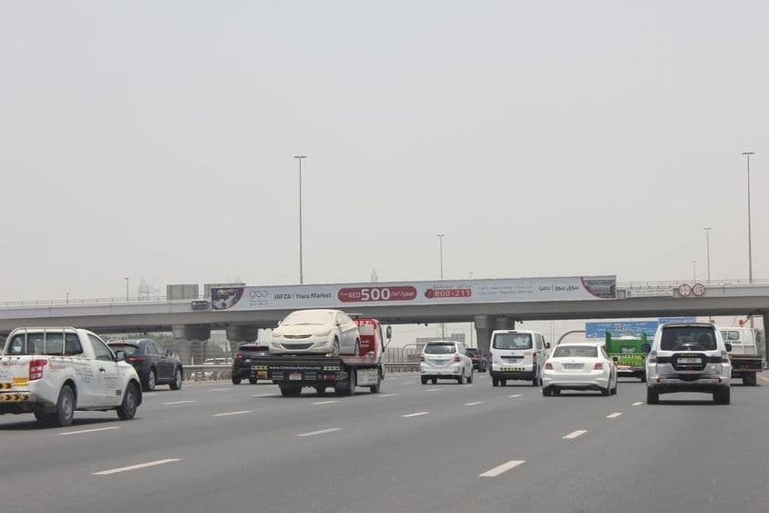 Dubai highway with billboards.