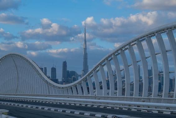 Maidan Bridge in Dubai with cityscape view.