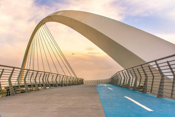 Tolerance Bridge Dubai with sunset view.
