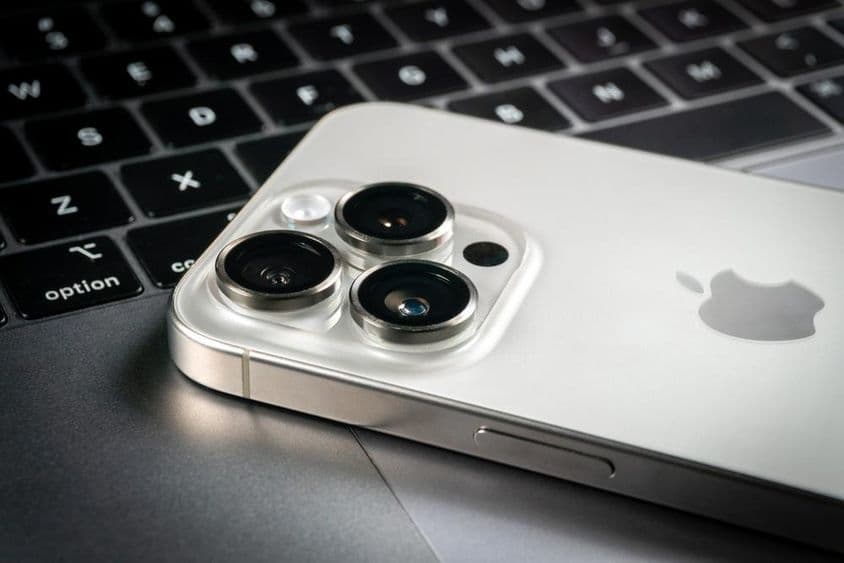 Apple iPhone 15 Pro and Apple Macbook Pro laptop.