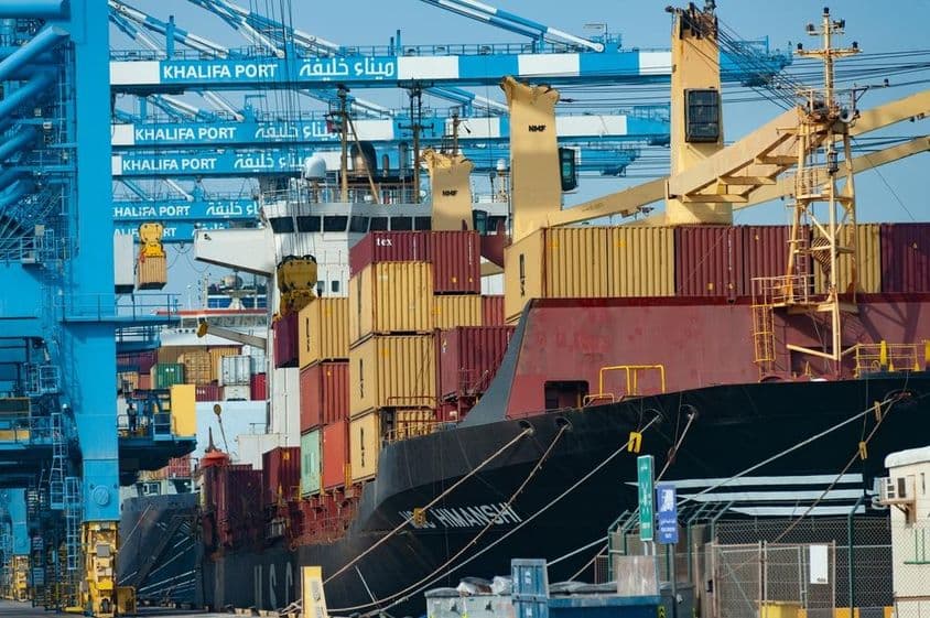 Unloading containers from a container ship at Khalifa Port, Abu Dhabi.