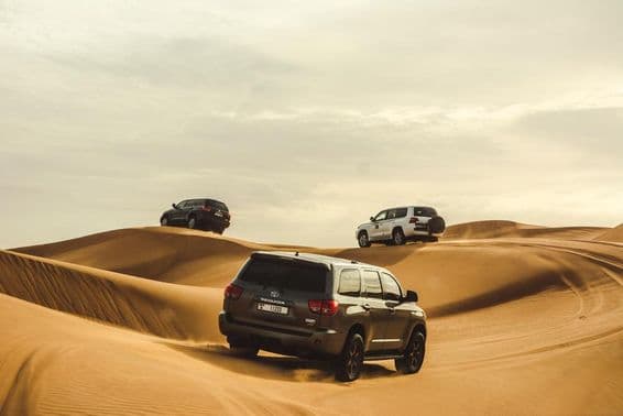 4x4 vehicles on the dunes of the Dubai desert.
