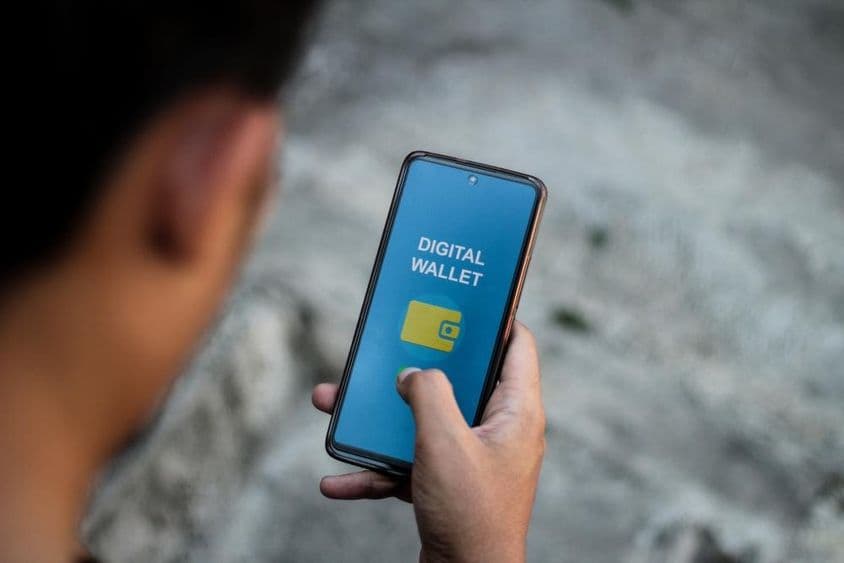 Digital wallet application interface on a smartphone screen.