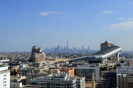 Aerial view of Dubai city from Al Barsha district, United Arab Emirates.