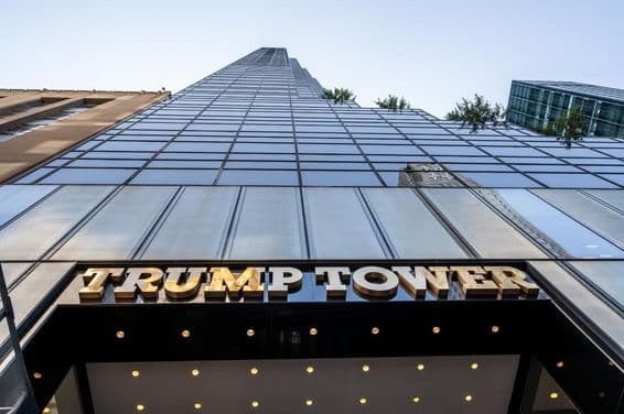 Iconic photo of the Trump Tower entrance highlighting the gold metal signage.
