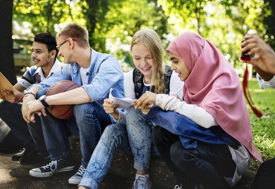 A group of diverse teenagers in Dubai.