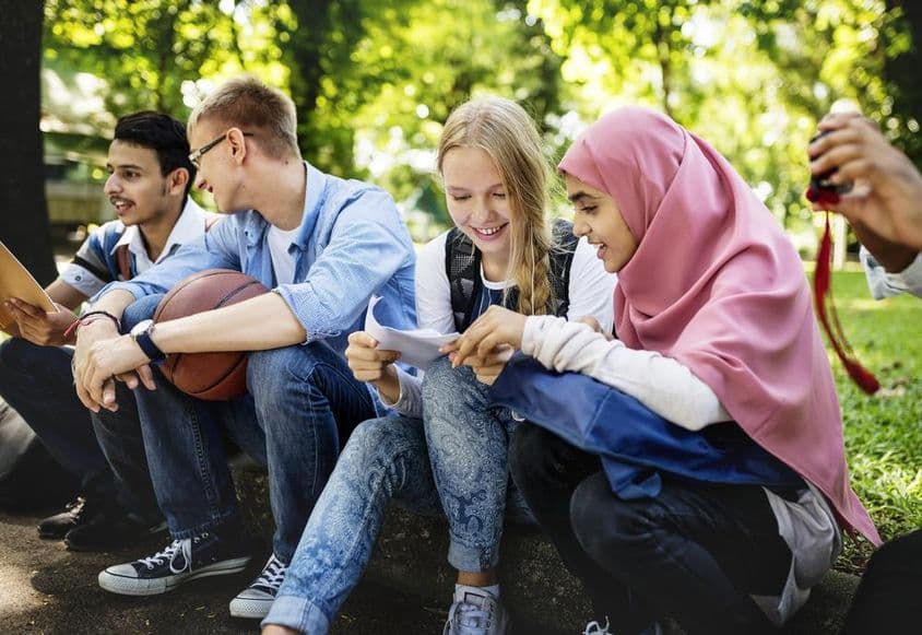A group of diverse teenagers in Dubai.
