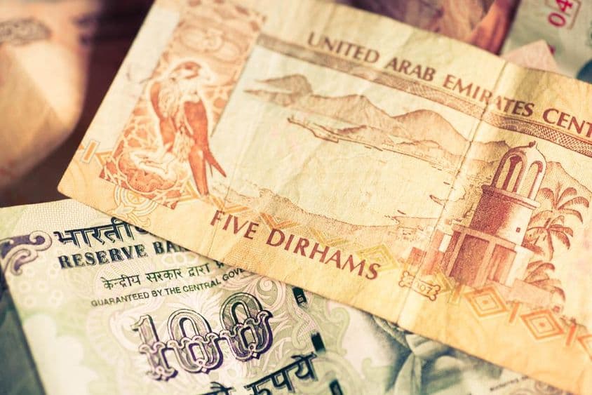 Currencies of the United Arab Emirates and the Republic of India.