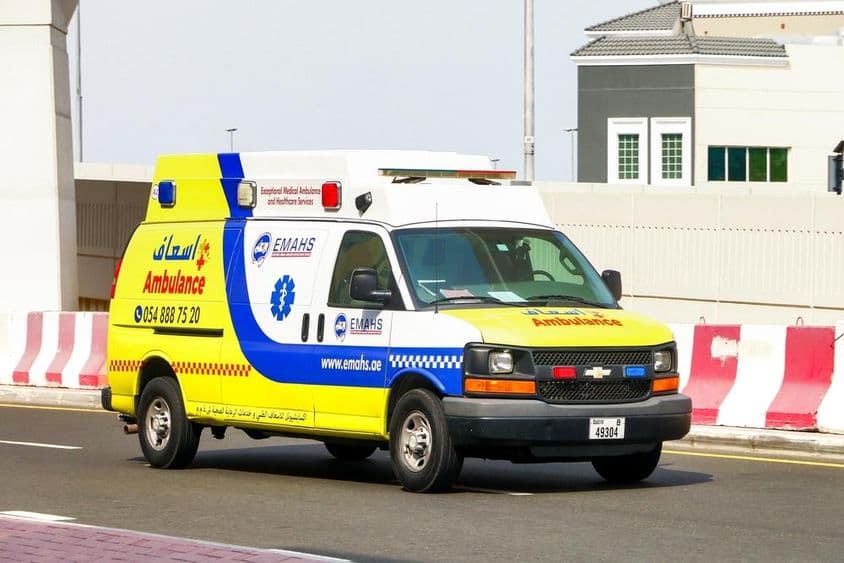 Dubai, Chevrolet Express ambulance on a city street.