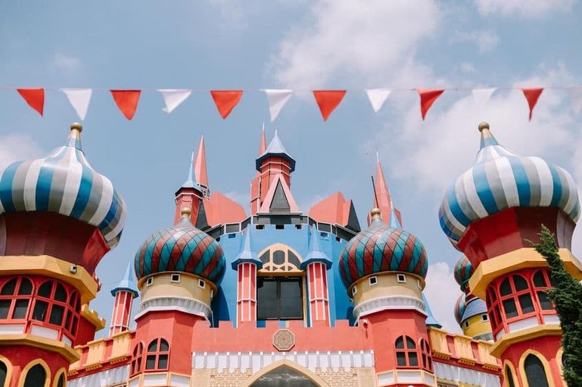 Disneyland iconic castle with fairy-tale towers and magical details.