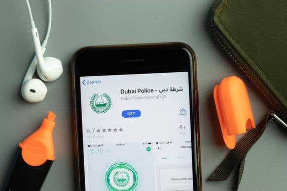 The Dubai Police mobile app icon on a phone screen.