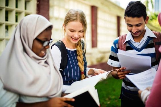 Children looking at the exam results.