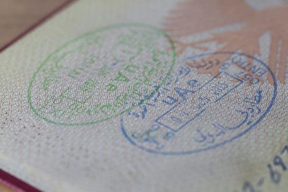 Entry and exit stamp of the United Arab Emirates in a German passport.