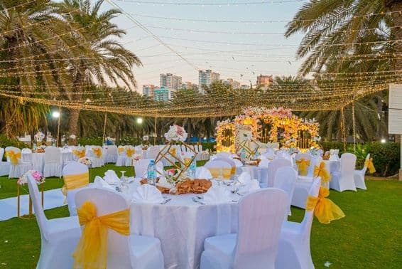 Elegant wedding decoration in a garden in Sharjah.