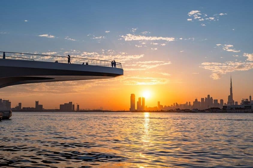 Dubai cityscape at sunset.