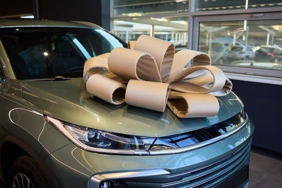 Prize car decorated with ribbon for a festive occasion.