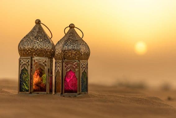 Arab lantern in the desert at sunset.