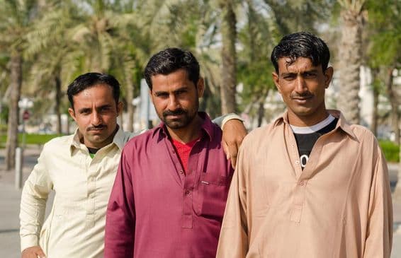 Pakistani construction workers on their day off near Deira in Bur Dubai.