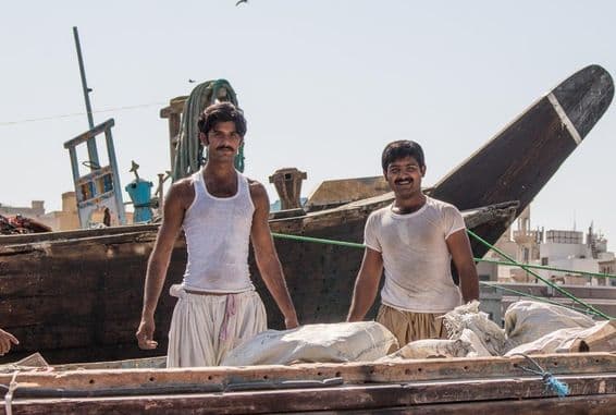 Pakistani workers working in the morning.