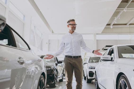 Confident wealthy adult man shopping wearing a classic shirt.