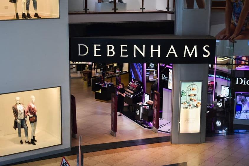 The exterior of a Debenhams store in a shopping mall.